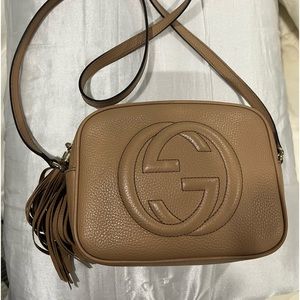Gucci crossbody bag, slightly worn. Stain inside top right corner